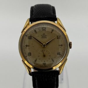 Reloj de pulsera Vidal Super con 15 rubíes y correa de piel negra.